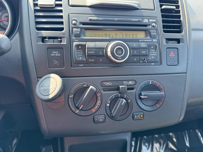 used 2009 Nissan Versa car, priced at $4,990