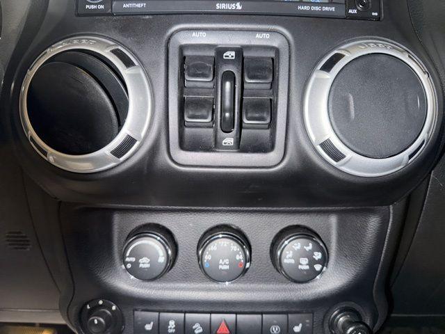 used 2014 Jeep Wrangler Unlimited car, priced at $18,981