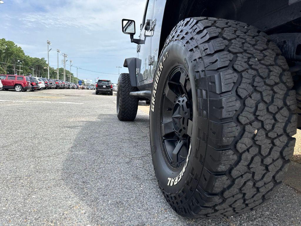 used 2014 Jeep Wrangler Unlimited car, priced at $16,157