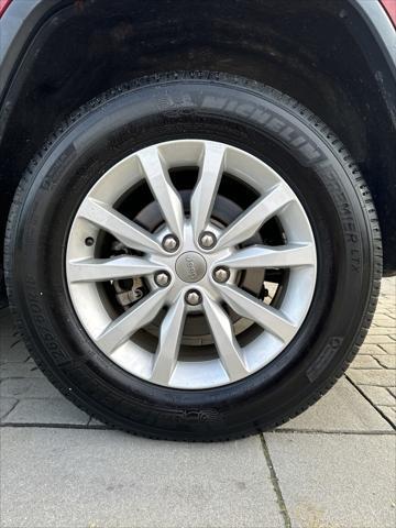 used 2015 Jeep Grand Cherokee car, priced at $10,000