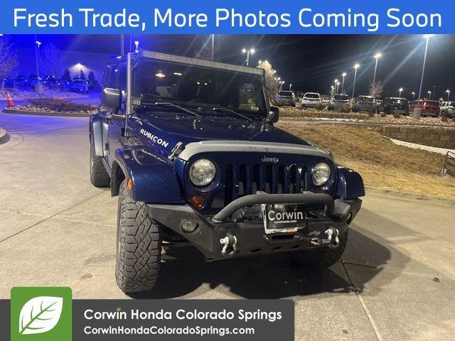 used 2013 Jeep Wrangler Unlimited car, priced at $17,400