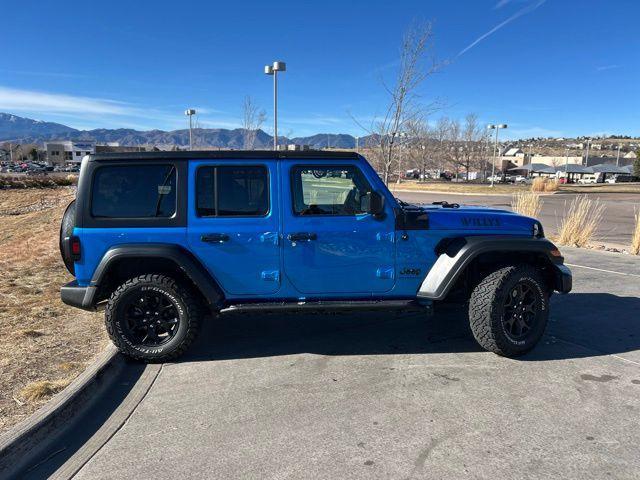 used 2023 Jeep Wrangler car, priced at $27,200