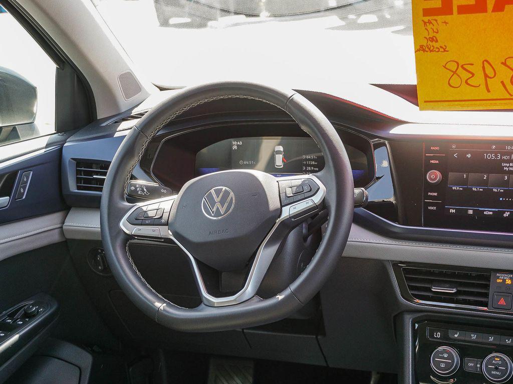 used 2024 Volkswagen Taos car, priced at $16,786