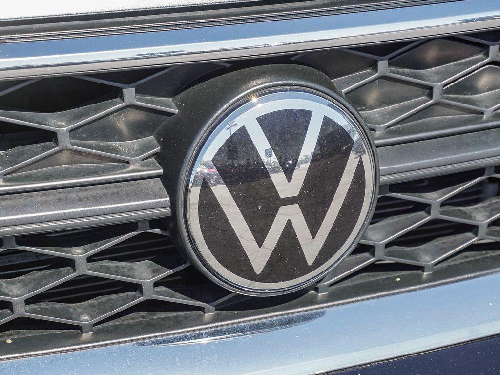 used 2024 Volkswagen Taos car, priced at $16,786