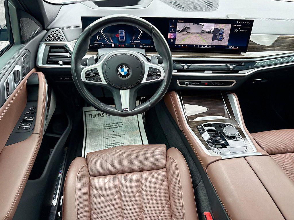 used 2024 BMW X6 car, priced at $65,062