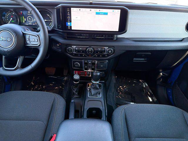 used 2024 Jeep Wrangler 4xe car, priced at $30,837