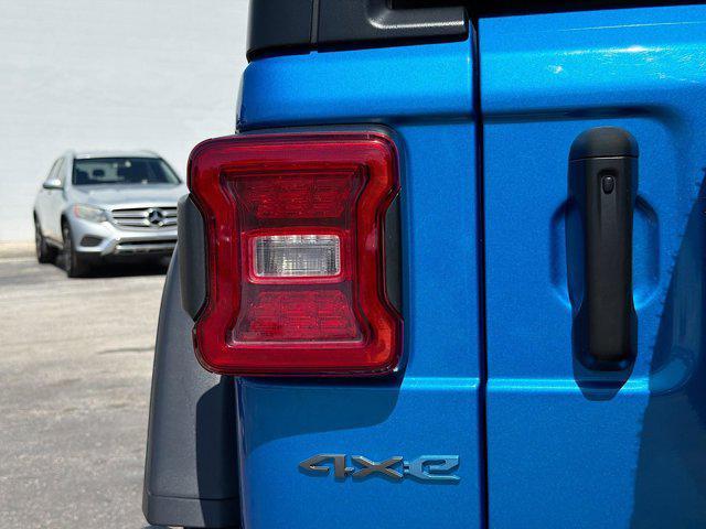 used 2024 Jeep Wrangler 4xe car, priced at $30,837