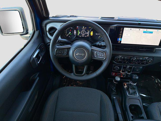 used 2024 Jeep Wrangler 4xe car, priced at $30,837