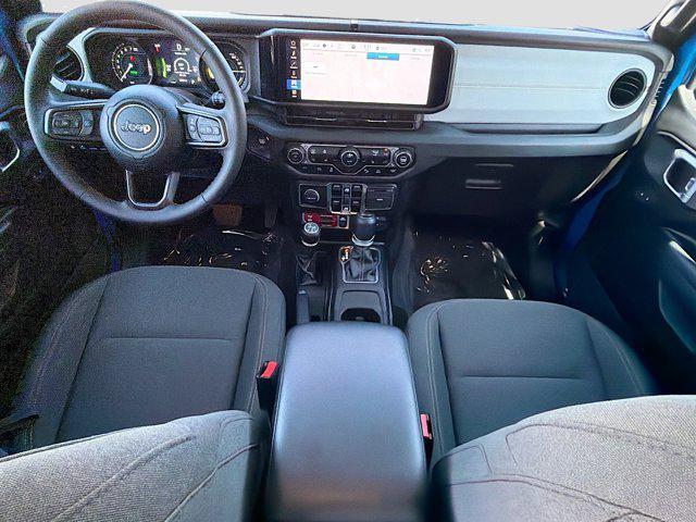 used 2024 Jeep Wrangler 4xe car, priced at $30,837