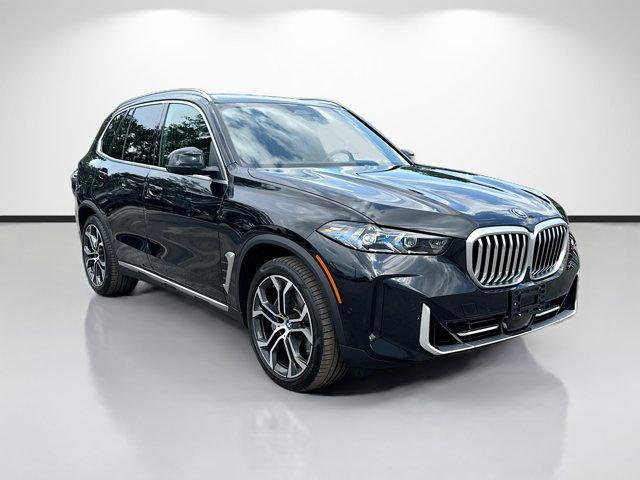 used 2025 BMW X5 PHEV car, priced at $59,082