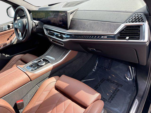 used 2025 BMW X5 PHEV car, priced at $59,082