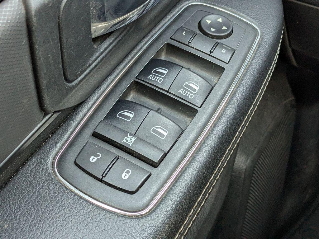 used 2018 Ram 1500 car, priced at $24,203