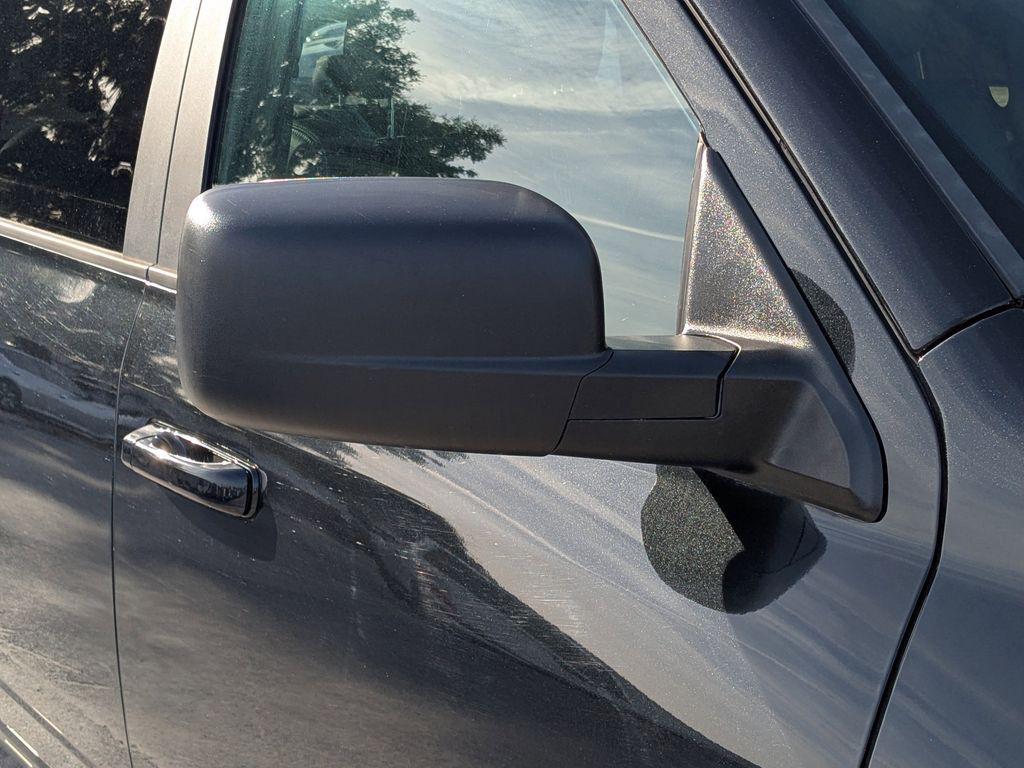 used 2018 Ram 1500 car, priced at $24,203