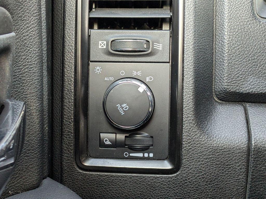 used 2018 Ram 1500 car, priced at $24,203