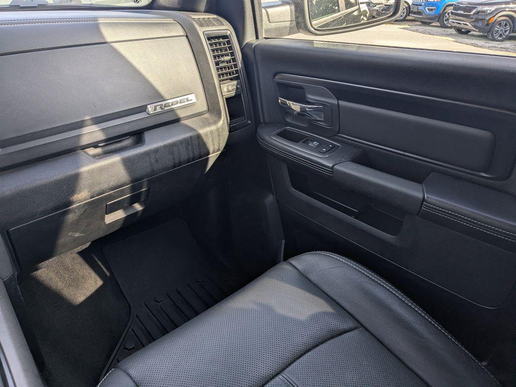 used 2018 Ram 1500 car, priced at $24,203