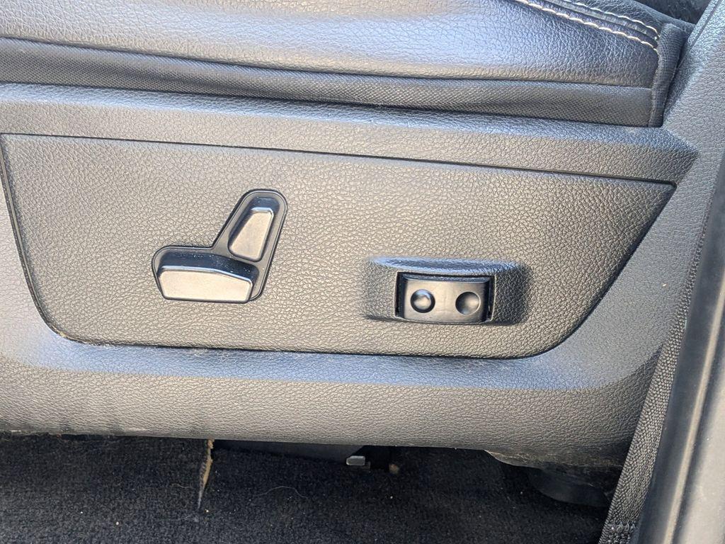 used 2018 Ram 1500 car, priced at $24,203