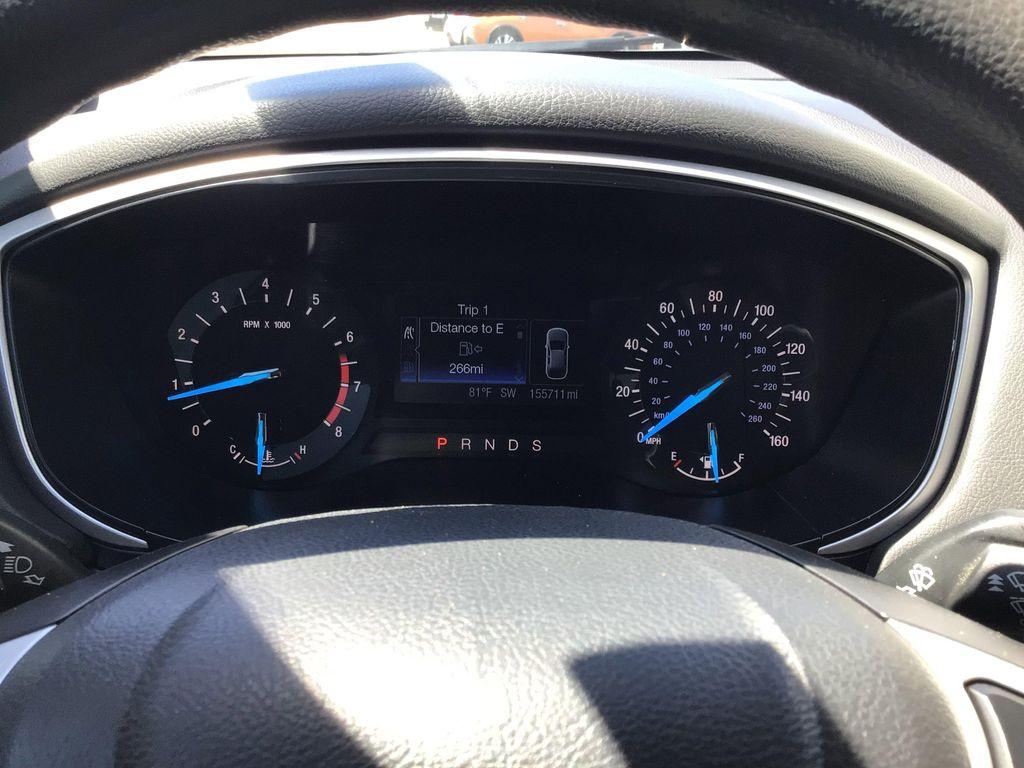 used 2015 Ford Fusion car, priced at $7,999