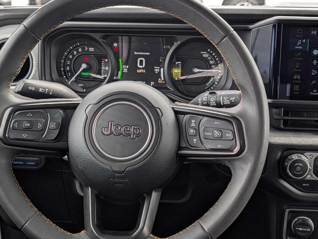used 2024 Jeep Wrangler 4xe car, priced at $27,891