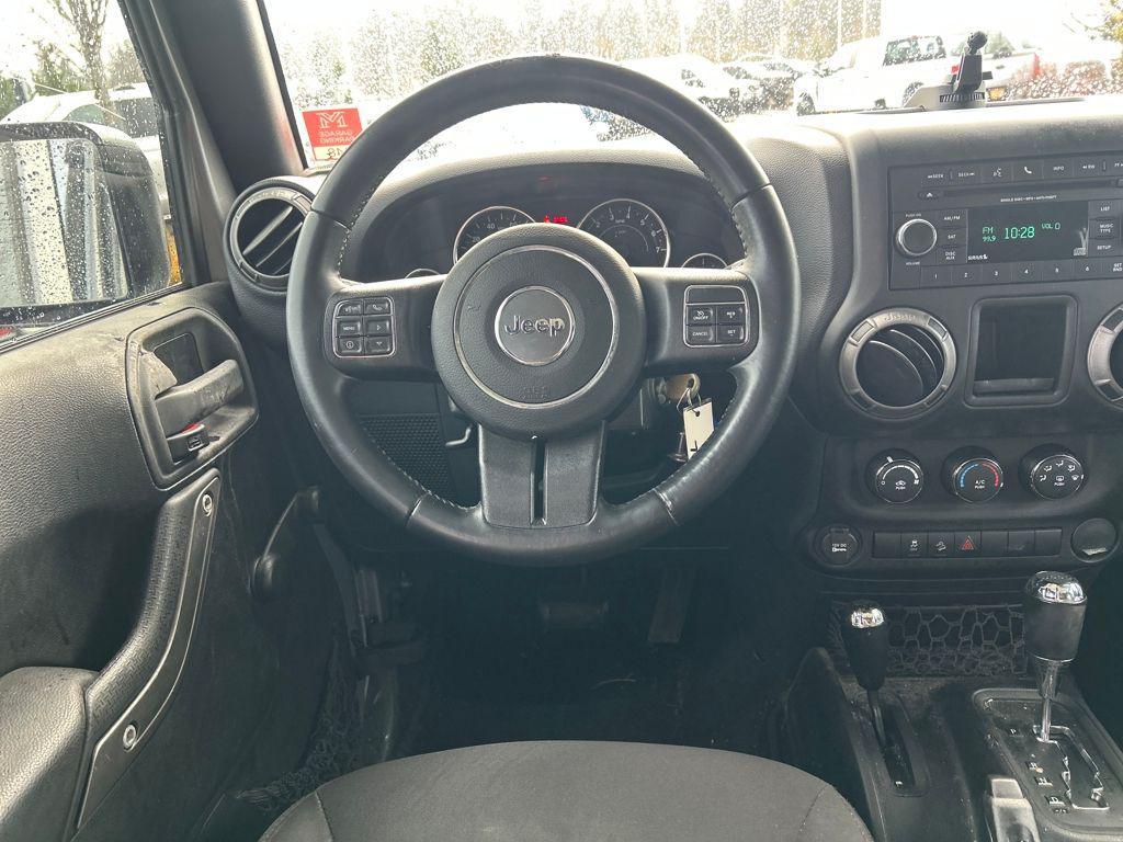 used 2015 Jeep Wrangler Unlimited car, priced at $16,683