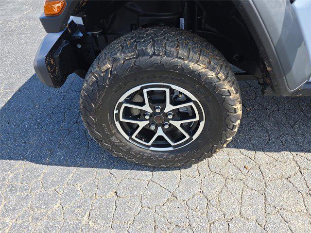 used 2025 Jeep Wrangler car, priced at $49,997