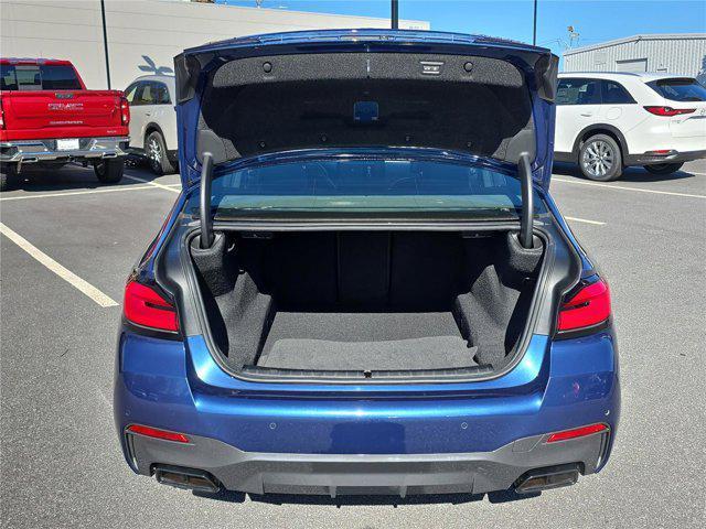 used 2023 BMW M550 car, priced at $59,697