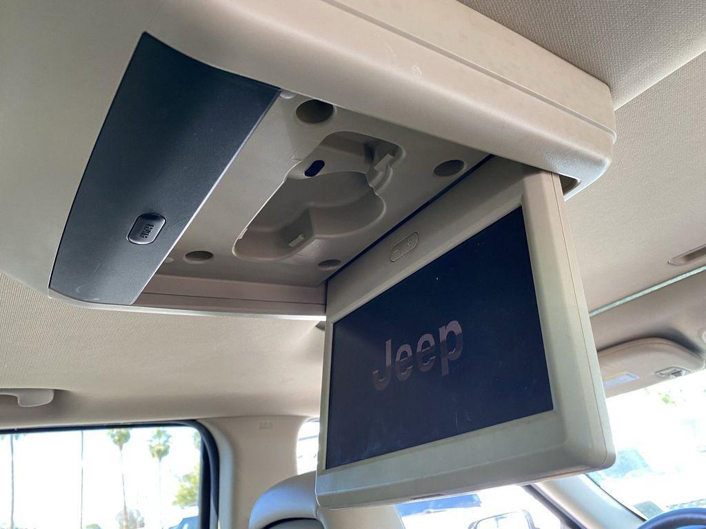 used 2011 Jeep Grand Cherokee car, priced at $10,996