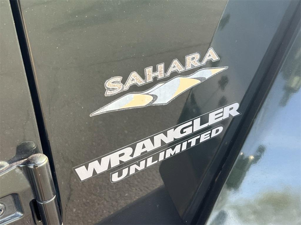 used 2011 Jeep Wrangler Unlimited car, priced at $15,245
