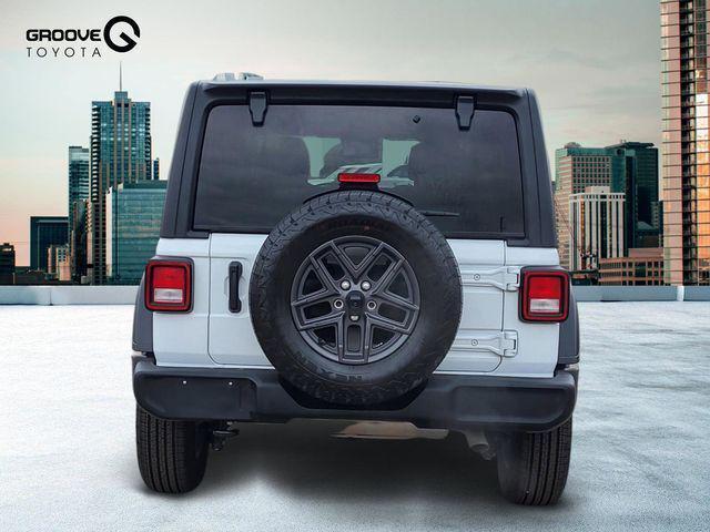 used 2024 Jeep Wrangler car, priced at $33,210