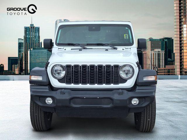 used 2024 Jeep Wrangler car, priced at $33,210