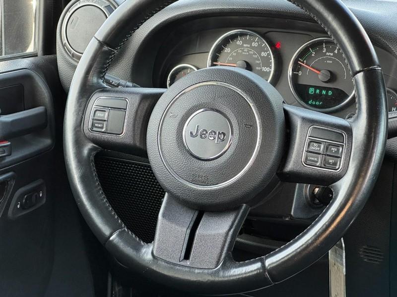 used 2015 Jeep Wrangler Unlimited car, priced at $9,970