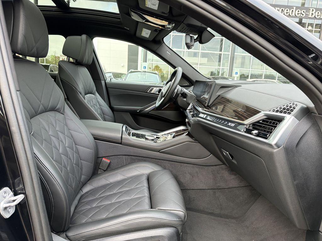 used 2025 BMW X6 car, priced at $61,122