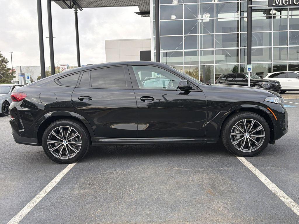 used 2025 BMW X6 car, priced at $61,122