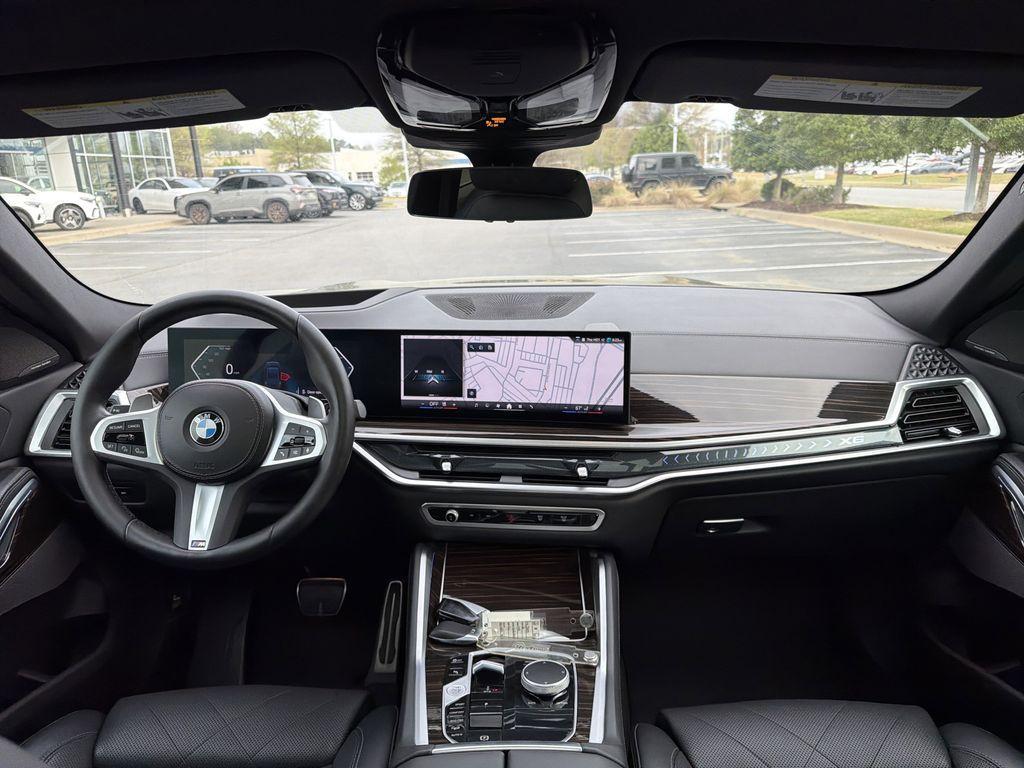 used 2025 BMW X6 car, priced at $61,122