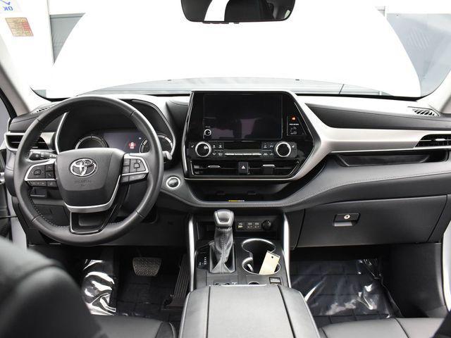 used 2024 Toyota Highlander Hybrid car, priced at $48,056