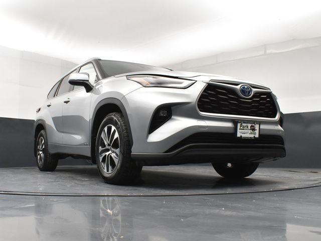 used 2024 Toyota Highlander Hybrid car, priced at $48,056
