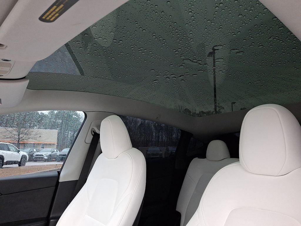 used 2023 Tesla Model Y car, priced at $27,540