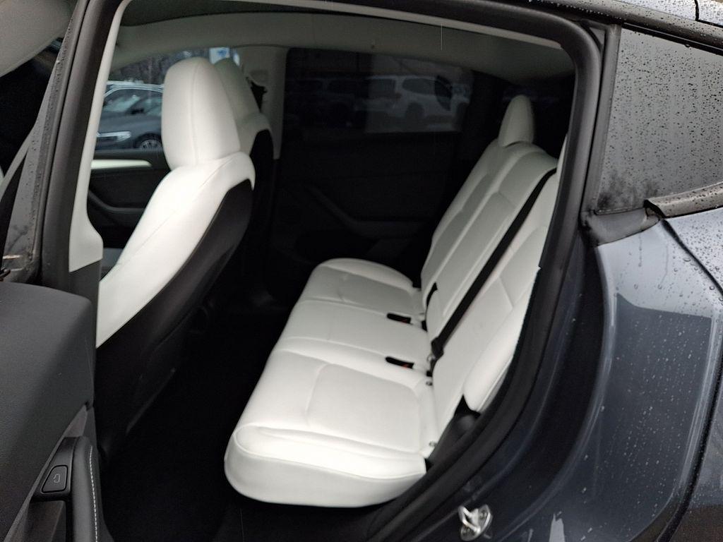 used 2023 Tesla Model Y car, priced at $27,540