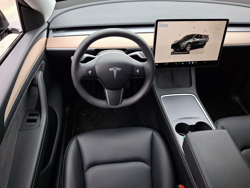 used 2024 Tesla Model Y car, priced at $32,990
