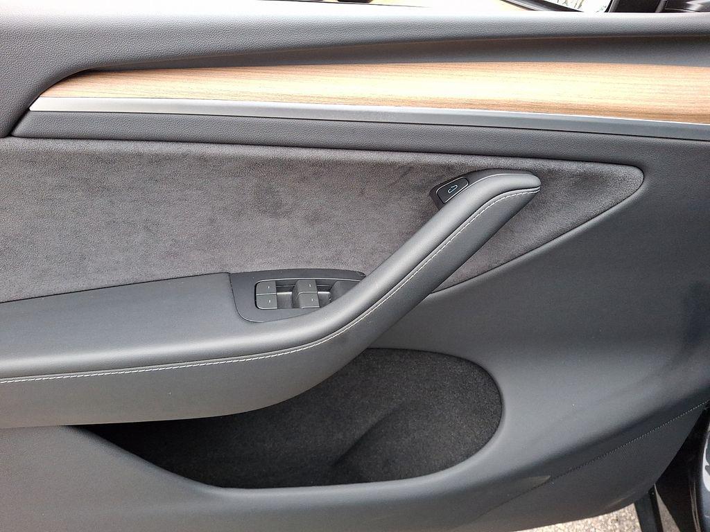 used 2024 Tesla Model Y car, priced at $32,990