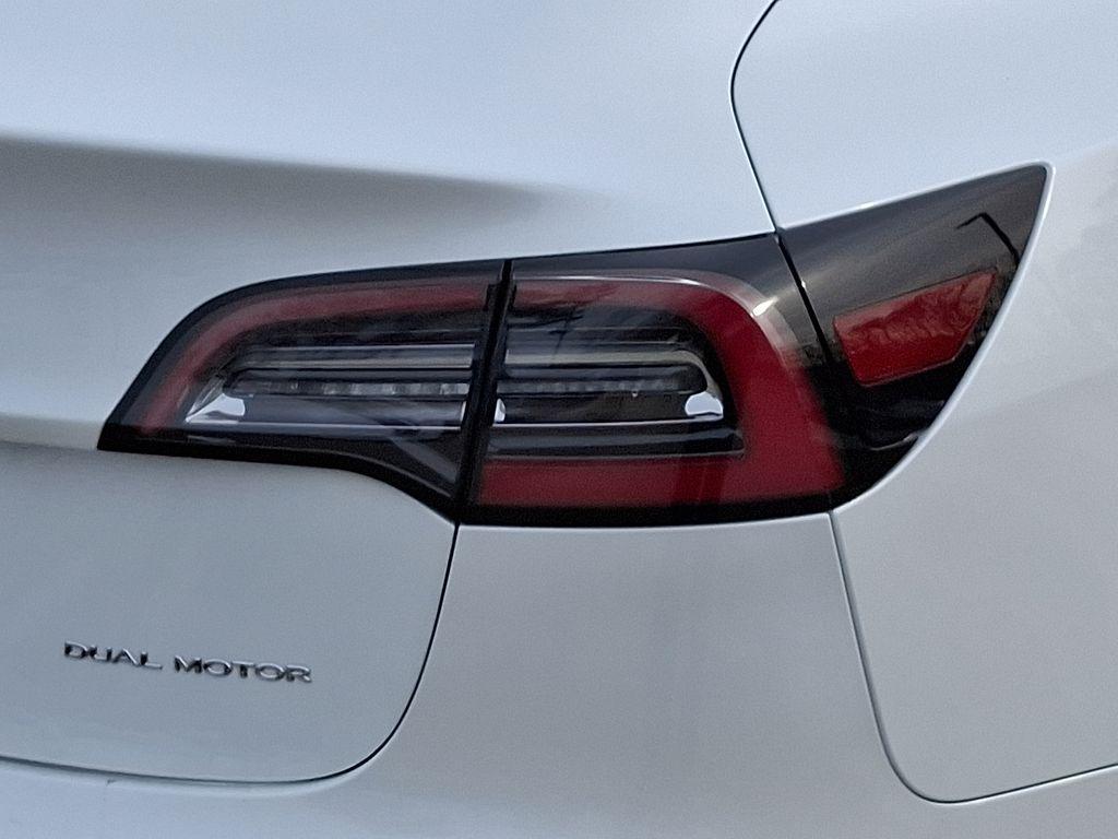 used 2022 Tesla Model 3 car, priced at $21,499