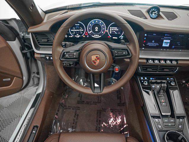 new 2026 Porsche 911 car, priced at $208,530