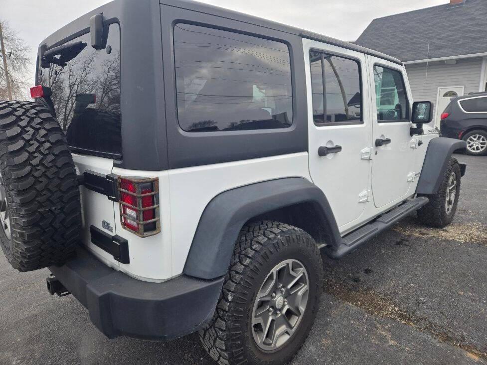 used 2014 Jeep Wrangler Unlimited car, priced at $16,850