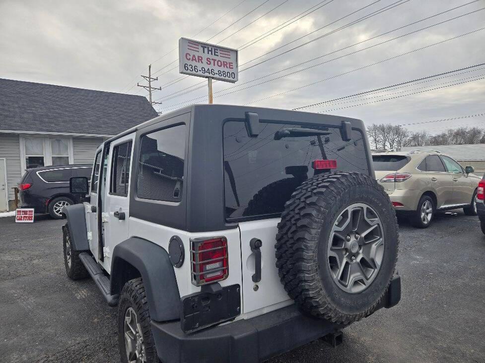 used 2014 Jeep Wrangler Unlimited car, priced at $16,850
