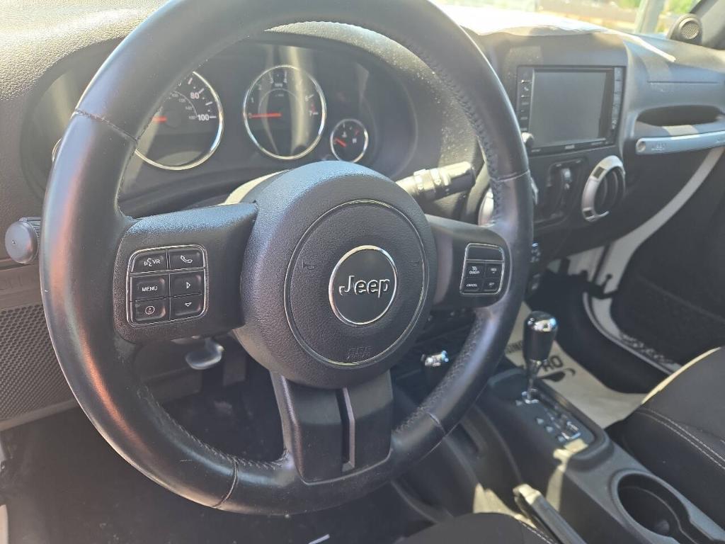 used 2014 Jeep Wrangler Unlimited car, priced at $15,048