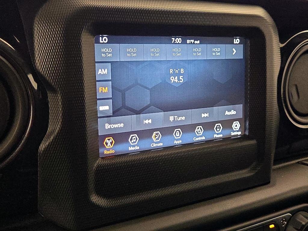 used 2023 Jeep Wrangler car, priced at $33,998