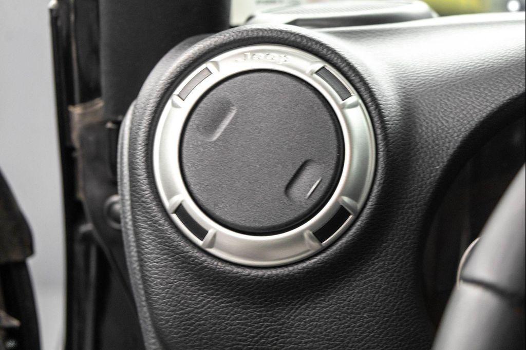 used 2018 Jeep Wrangler JK Unlimited car, priced at $19,977