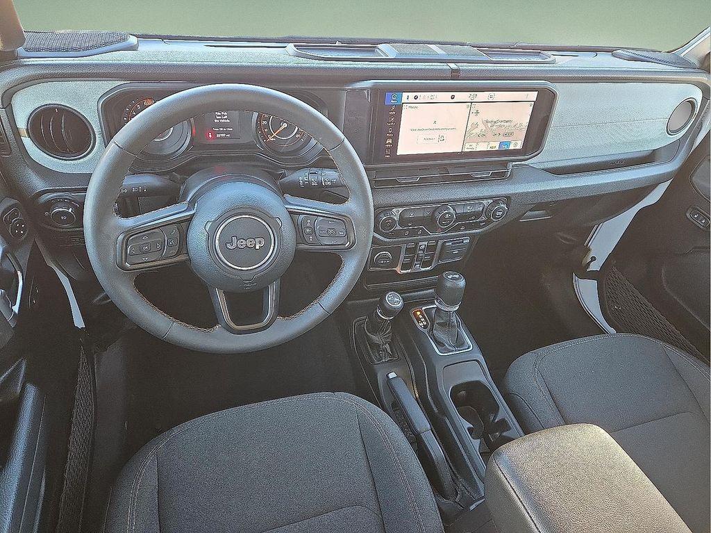 used 2024 Jeep Wrangler car, priced at $30,306