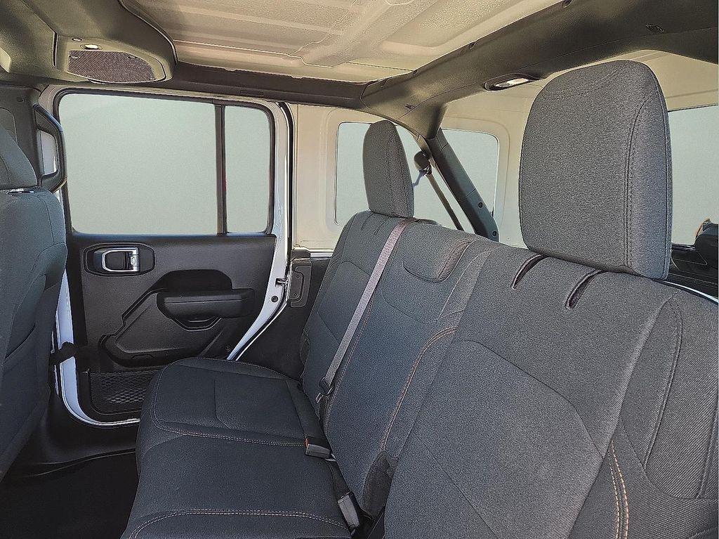 used 2024 Jeep Wrangler car, priced at $30,306