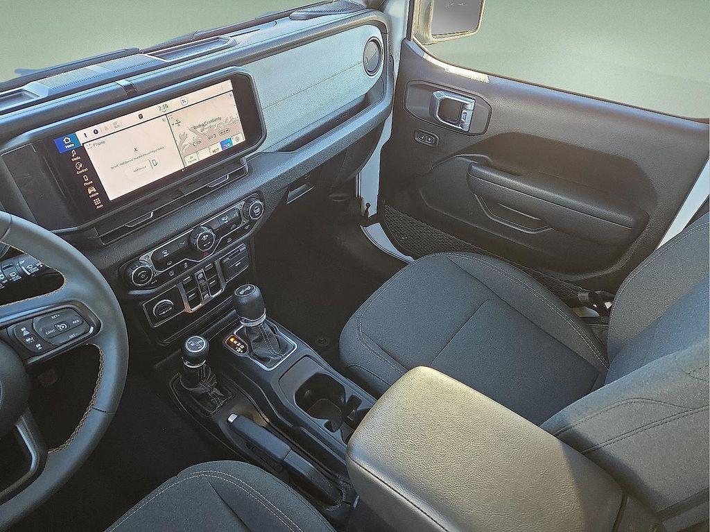 used 2024 Jeep Wrangler car, priced at $30,306