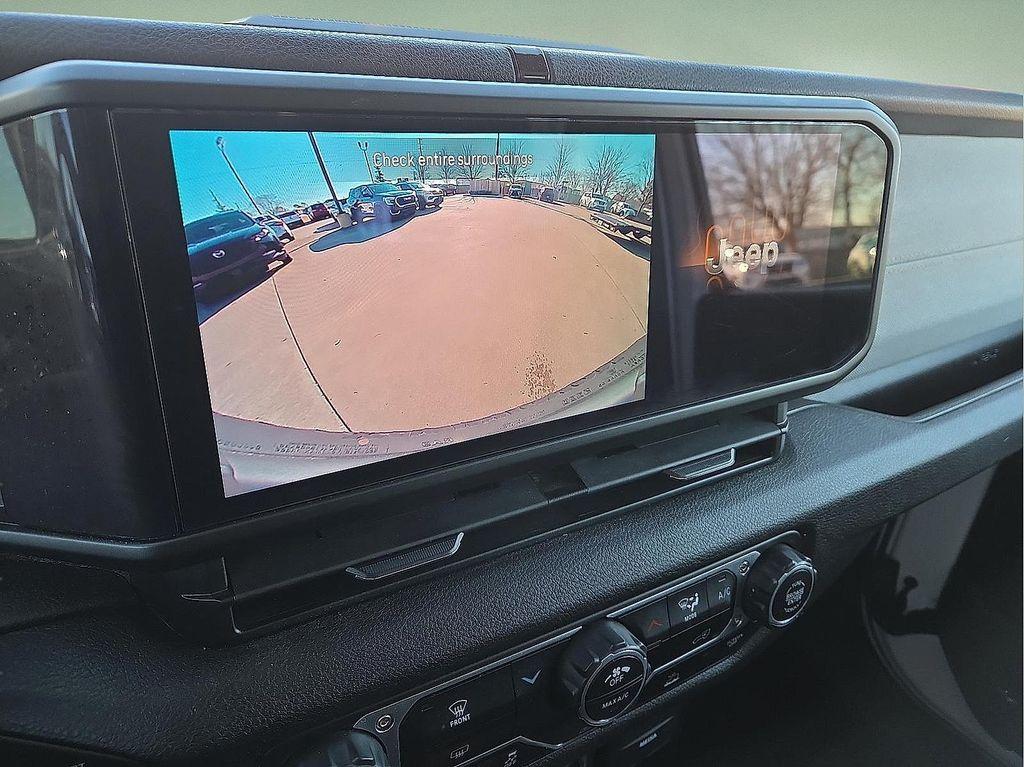 used 2024 Jeep Wrangler car, priced at $30,306